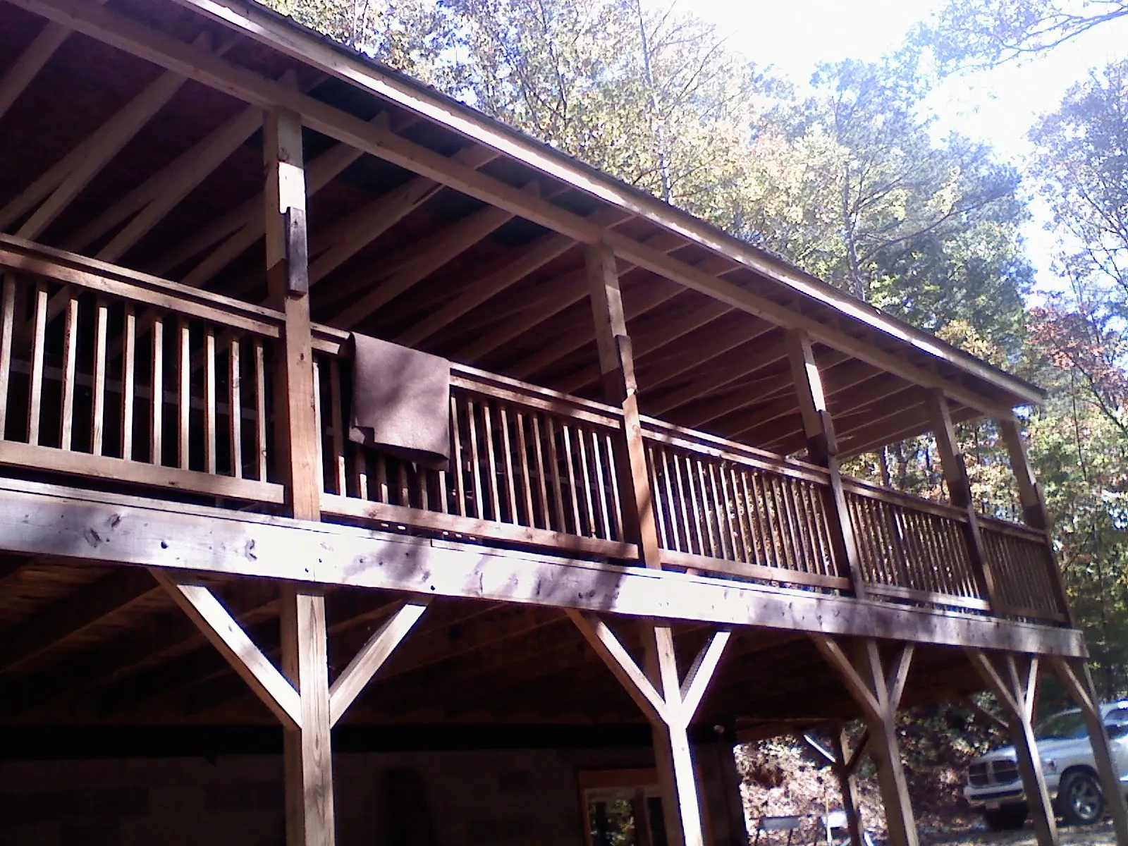 Timber framing under a new elevated porch and deck — Roof Leak Repair in Ocala by Roofing Brothers